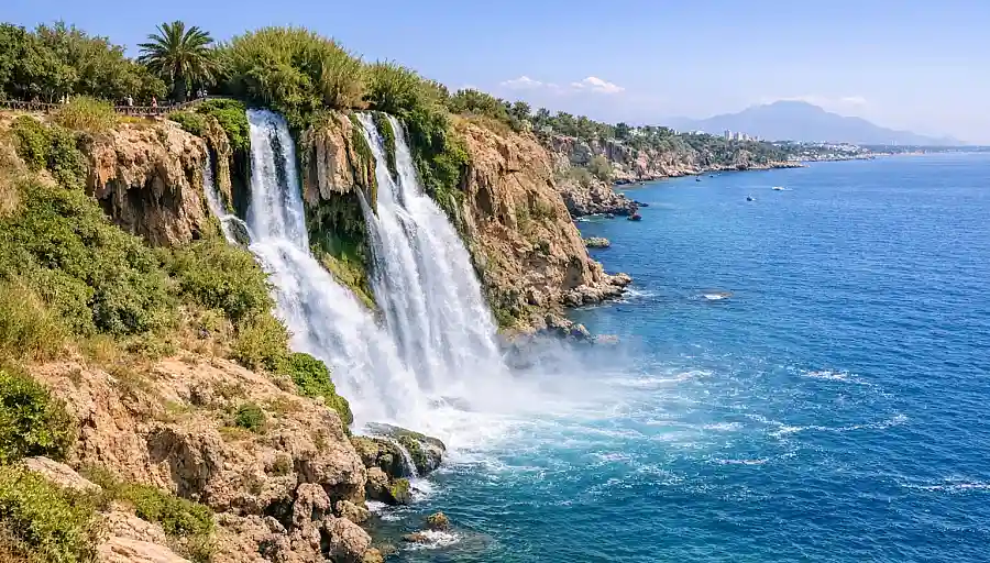 Lower Düden Waterfall in Antalya flowing over cliffs into the sea